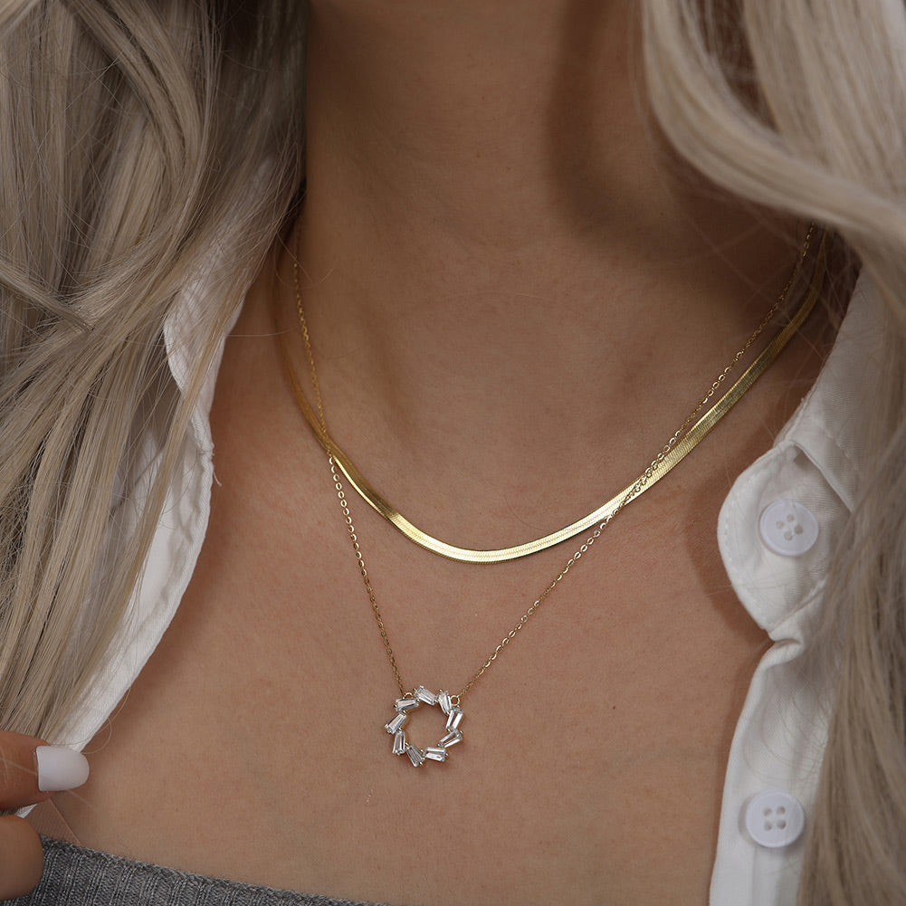 The Celeste Orbit Necklace and the Return of Warm Jewellery